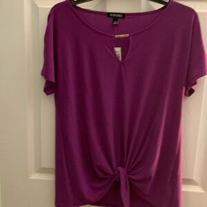 New blouse with tags, size medium.